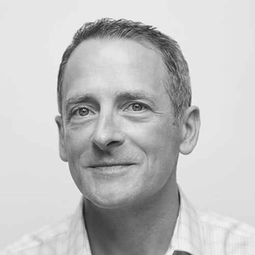 Headshot of Greg Sieczkiewicz, PhD, JD a man with short hair smiling.